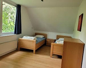 Double bedroom with wooden floor in VZ2330 Holiday home Oostkapelle, Walcheren, Zeeland.