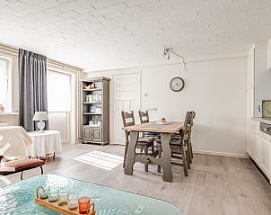 Cozy living room in vacation home ZE118 with comfortable sofa in Oostkapelle, Walcheren, Zeeland.