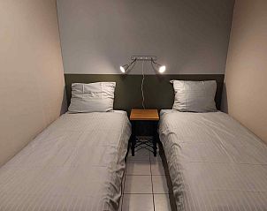 Comfortabele slaapkamer in ZE319 vakantiehuis Oostkapelle Walcheren met twee bedden