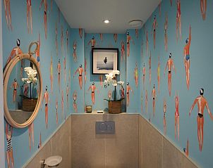 Comfortabele slaapkamer in VZ1092 Appartement in Oostkapelle, Walcheren, Zeeland met stijlvol beddengoed.