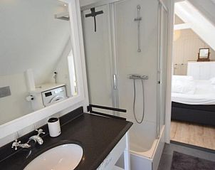 Uitzicht op de groene omgeving vanuit VZ2316 Vrijstaand vakantiehuis in Oostkapelle, Walcheren, Zeeland.