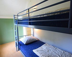Slaapkamer met stapelbed in VZ2329 Vakantiehuis Oostkapelle, ideaal voor kinderen, Walcheren.
