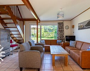 Spacious living room with sitting area in vacation home ZE414, Oostkapelle, Walcheren, Zeeland.