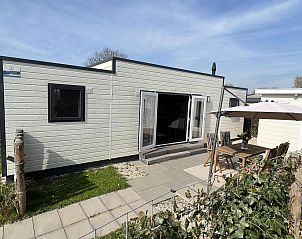 Cozy terrace at VZ652 Chalet Oostkapelle, vacation home in Zeeland.