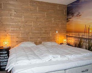 Airy view of the living room of vacation home ZE1402 in Oostkapelle, Walcheren, Zeeland.