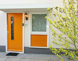 Stairs up in vacation home ZE1402 in Oostkapelle, Walcheren, Zeeland with modern finishes.