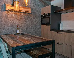 Game closet in the living room of vacation home ZE1402 in Oostkapelle, Walcheren, Zeeland.