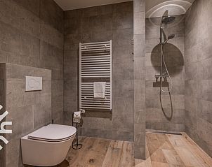 Outdoor kitchen of vacation home ZE145 in Oostkapelle, Walcheren, with modern amenities.