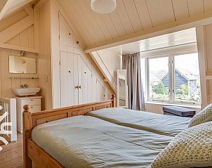 Zithoek in de tuin van vakantiehuis ZE049, Oostkapelle, Walcheren, Zeeland voor ontspanning.