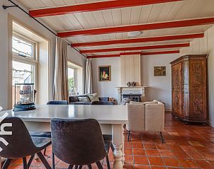 Gezellige tuin van vakantiehuis ZE049 in Oostkapelle, Walcheren, Zeeland met zitmogelijkheden.