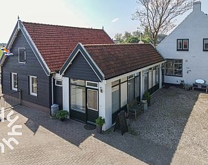 Vakantiehuis ZE187 in Oostkapelle, Zeeland met charmante voorgevel en landelijke omgeving.