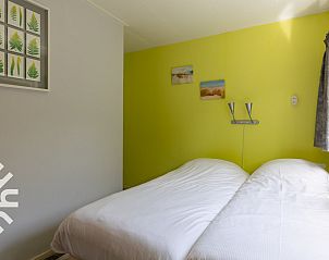 Slaapkamer met uitzicht in vakantiehuis ZE242, Oostkapelle, Walcheren, Zeeland.