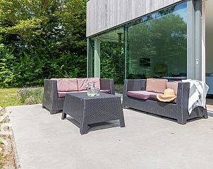 Exterior of vacation home ZE263 in Westkapelle with modern architecture.