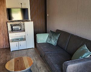 Modernes und gemtliches Wohnzimmer von VZ2343 Ferienhaus Westkapelle in Zeeland.