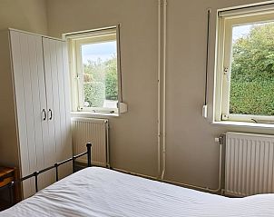 Slaapkamer in Vakantiehuis in Westkapelle met veel natuurlijk licht, Walcheren, Zeeland.