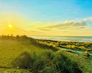 Atemberaubender Sonnenuntergang am Strand bei Ferienhaus Beach House Westkapelle 103 D, Westkapelle, Walcheren.