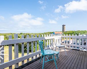 Ontspannen in de tuin van vakantiehuis ZE082, Domburg, Walcheren, Zeeland.