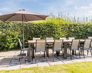 Gezellige slaapkamer in U10 Comfort bungalow, Domburg, Walcheren, Zeeland met modern interieur en comfortabele bedden.