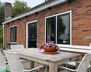 Terras van Vakantiehuisje in Domburg, Walcheren, perfect voor buiten dineren.