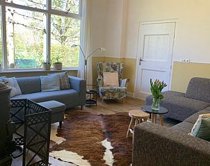 Gezellige zithoek met haard in Vakantiehuisje in Domburg, Walcheren.