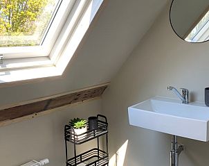 Knusse slaapkamer met twee bedden in Vakantiehuisje in Domburg, Walcheren.