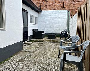 Gezellig terras in VZ2419 Vakantiewoning Vlissingen, ideaal voor buitenontspanning in Zeeland.