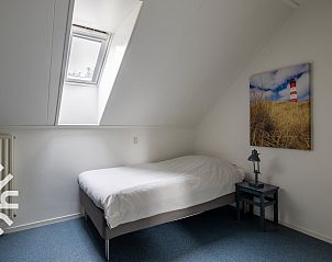 Modern interieur met trap en toilet in vakantiehuis ZE256 in Aagtekerke, Walcheren, Zeeland.