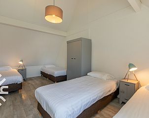 Gezellig terras van vakantiehuis ZE1446 in Aagtekerke, Walcheren, met uitzicht op de natuur.