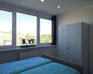 Schlafzimmer mit Aussicht in VZ679 Wohnung Zoutelande, Zoutelande, Zeeland.