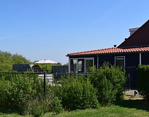 Vakantiehuis in Zoutelande met zonnige tuin en uitzicht op natuur, gelegen in Walcheren, Zeeland.