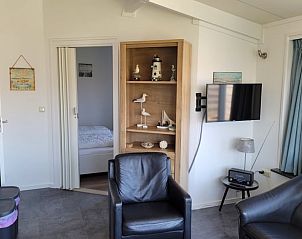 Gezellige woonkamer in Vakantiehuis in Zoutelande met comfortabele zitplaatsen, Walcheren, Zeeland.