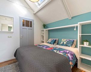 Schattiger Garten mit Sitzgelegenheit im Ferienhaus ZE1201 in Zoutelande, Walcheren.