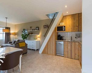 Open living room and kitchen in vacation home ZE1392, Zoutelande, Walcheren.