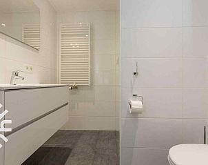 Kitchen and stairs in vacation home ZE1392 in Zoutelande, Walcheren.