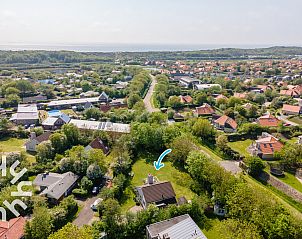 Schlafzimmer im Dachgeschoss mit Holzbalken im Ferienhaus ZE585 Zoutelande, Walcheren, Zeeland.