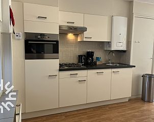 Stijlvolle woonkamer in vakantiehuis ZE301 in Zoutelande, Walcheren, met moderne inrichting.