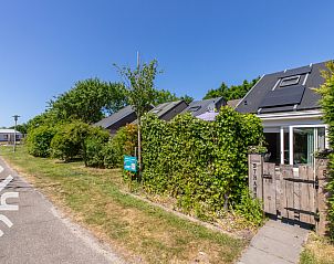Speeltuin en molen nabij vakantiehuis ZE1422 in Zoutelande, Walcheren, ideaal voor gezinnen.