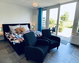 Bright bedroom with a view at VZ583 Studio Vrouwenpolder in Walcheren.