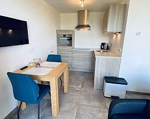 Modern kitchen with dining table in VZ583 Studio Vrouwenpolder, Vrouwenpolder.