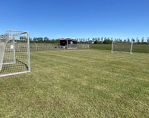 Soccer field at VZ583 Studio Vrouwenpolder, ideal for sporty guests.