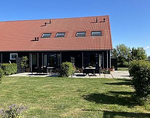 Achtertuin van VZ587 Vakantiewoning Vrouwenpolder met terras, Walcheren, Zeeland.