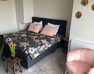 Cozy bedroom in Holiday home in Vrouwenpolder, Walcheren, Zeeland with comfortable beds.