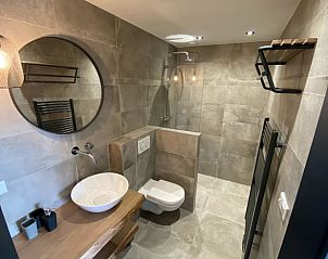 Stylish bathroom in Holiday Home in Vrouwenpolder, Walcheren, Zeeland with spacious shower.