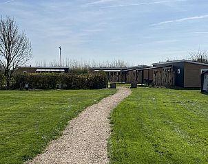 Schommel in de speeltuin van VZ627 Chalet Meliskerke, Walcheren