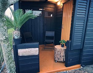 Houtkachel in Vakantiehuis in Middelburg, Walcheren, Zeeland voor een gezellige sfeer op koude avonden.