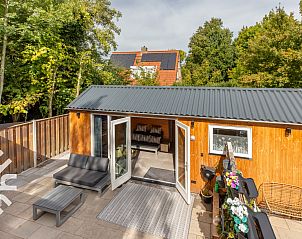 Moderne buitenruimte van vakantiehuis ZE1540 in Middelburg, Walcheren, Zeeland.