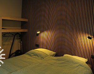 Wegwijzer nabij vakantiehuis ZE1544 in Biggekerke, Walcheren, met routes naar nabijgelegen dorpen, ideaal voor uitstapjes in Zeeland.