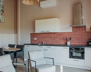 Offene Kche und Essbereich im Ferienhaus in Ritthem, Walcheren, Zeeland.