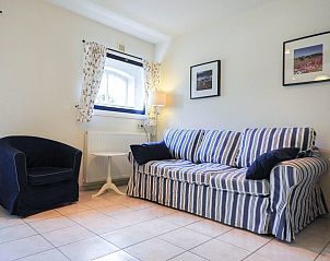 Sfeervolle zithoek in VZ136 Studio Grijpskerke, vakantiehuis in Zeeland.