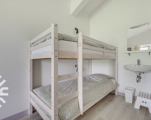 Traditionele ringrijder in de buurt van vakantiehuis ZE661 in Grijpskerke, Walcheren, Zeeland.